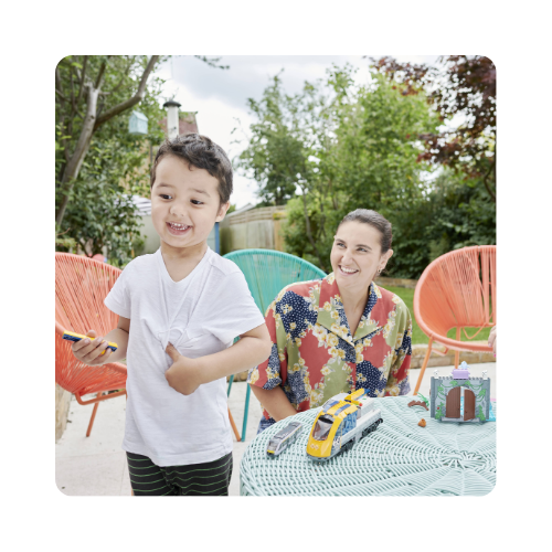 Sitter with boy laughing 